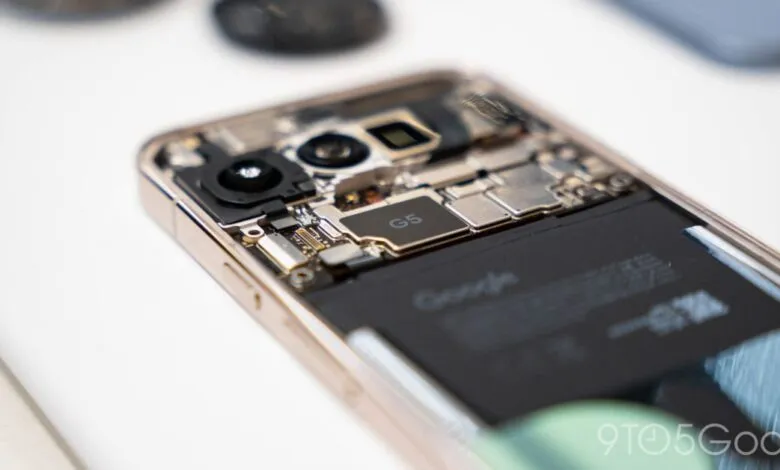 Close-up of a disassembled Google Pixel phone showing internal components and battery.