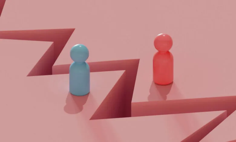 Two stylized figures, one blue and one red, separated by a jagged chasm.
