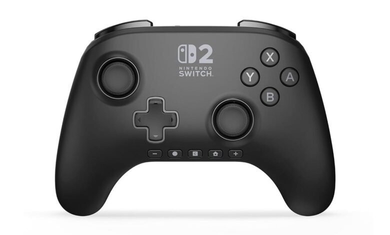 Black wireless Nintendo Switch controller with directional pad and buttons