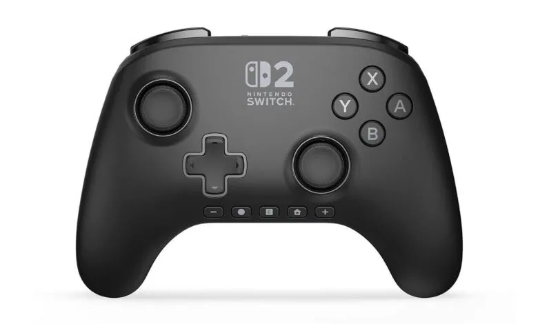 Black wireless Nintendo Switch controller with directional pad and buttons