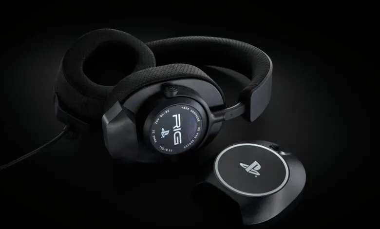 Black RIG gaming headset with PlayStation logo on a stand, against a dark background.