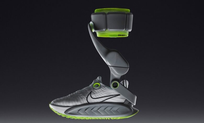 Futuristic athletic shoe with a gray exoskeleton and bright green accents.