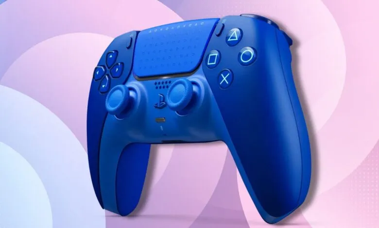 A vibrant blue PlayStation 5 DualSense controller against a soft pink and purple gradient background.