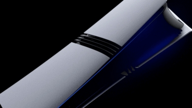 Close-up of a sleek, white and black PlayStation 5 console with blue accents.