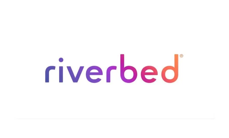 The Riverbed logo with a gradient from purple to orange.