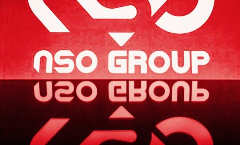Close-up of the NSO Group logo in white on a red background, with a reflection below.