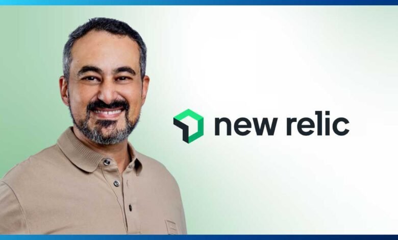Man smiling next to the New Relic logo and text