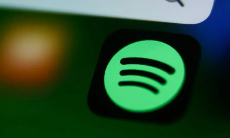 Close-up of the Spotify app icon on a digital screen.