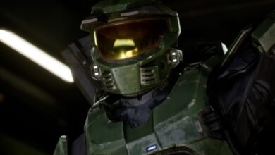 Close-up of Master Chief's green armor and golden visor.