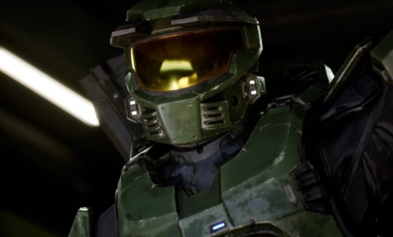 Close-up of Master Chief's green armor and golden visor.