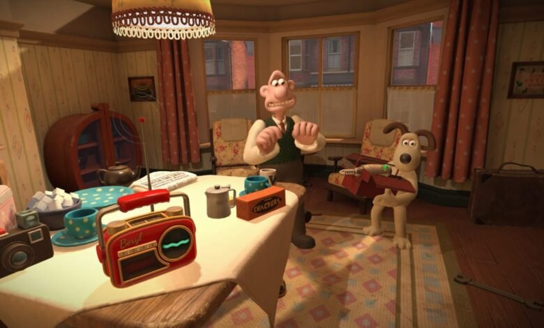 Wallace and Gromit in a cozy kitchen setting with a radio and crackers.