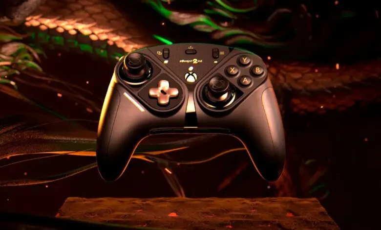 Close-up of a black Xbox controller with gold accents, set against a dark, fiery background.