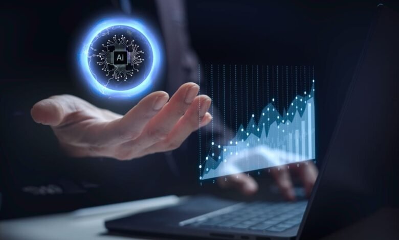 Hand holding a glowing AI chip hologram with a stock market graph overlay.