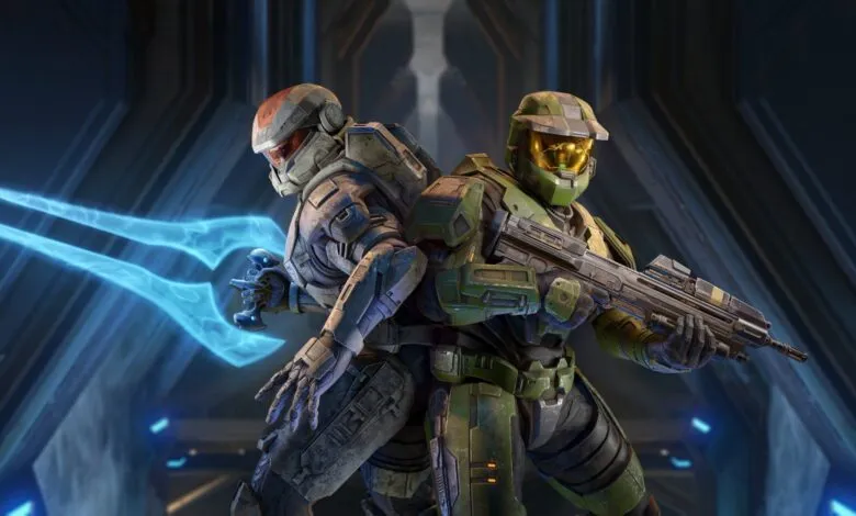 Two armored soldiers, one with a plasma sword, the other holding a rifle.