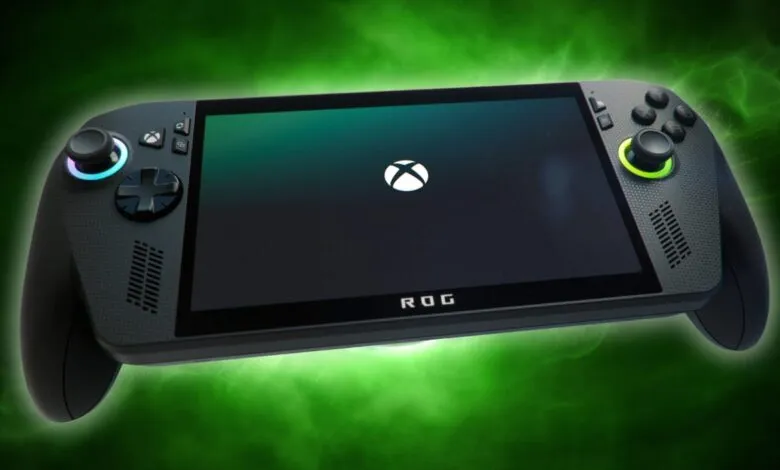 Close-up of a black handheld gaming device with an Xbox logo on the screen.