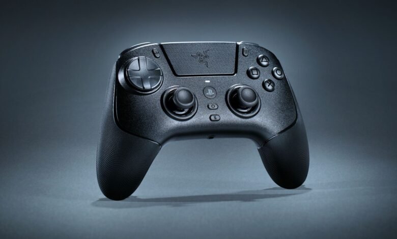 A black Razer gaming controller with textured grips and illuminated buttons.