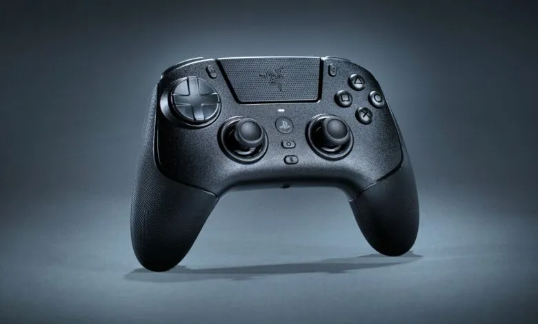 A black Razer gaming controller with textured grips and illuminated buttons.