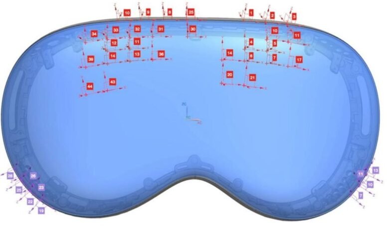 3D rendering of Apple Vision Pro with measurement markers and axes.