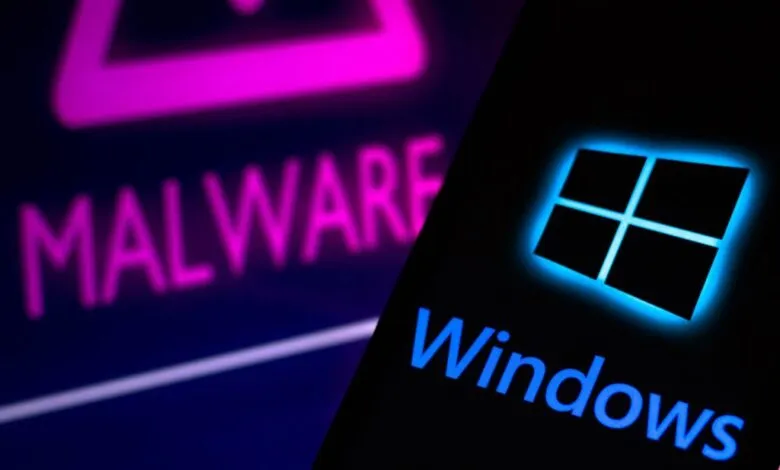 The Windows logo glows blue next to the word MALWARE in pink neon.