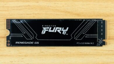 Kingston Fury Renegade G5 PCIe 5.0 NVMe M.2 SSD on a wooden surface.