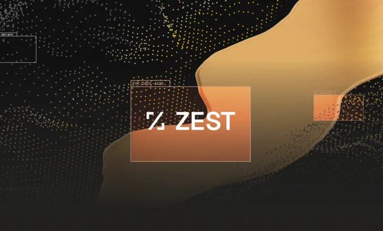 Zest logo with abstract digital particles and flowing golden shapes.