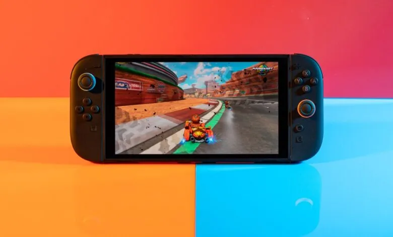 Nintendo Switch console displaying Mario Kart gameplay with colorful lighting.