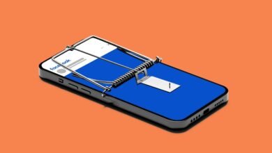 Smartphone displaying Facebook login screen set in a mouse trap.