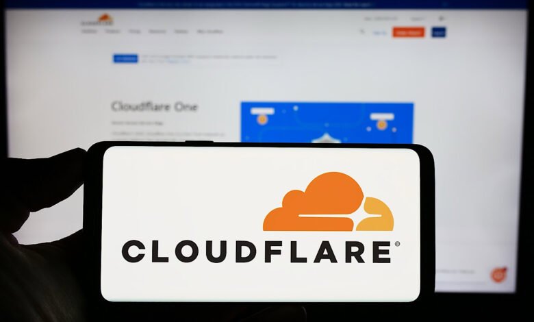 Smartphone displaying the Cloudflare logo and company name.