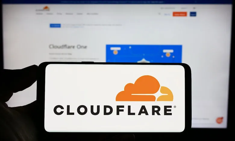 Smartphone displaying the Cloudflare logo and company name.