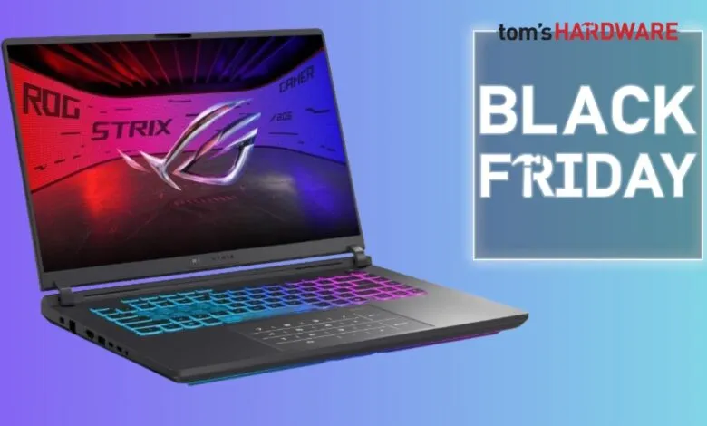 ASUS ROG Strix gaming laptop with RGB keyboard and 'Black Friday' graphic.
