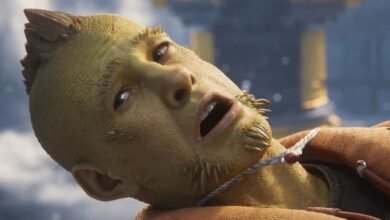 Close-up of a reptilian creature's face with scales and sharp teeth, looking upwards.