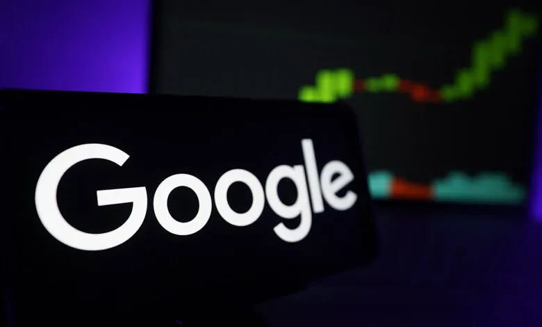 The Google logo is displayed prominently on a smartphone screen, with a stock market graph in the background.