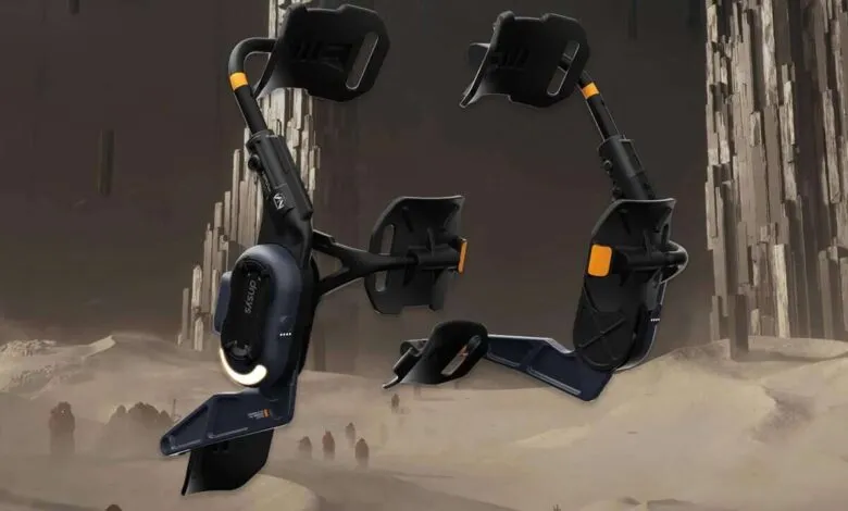 Futuristic exoskeleton device with black and blue components and orange accents.