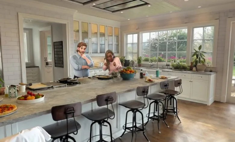 A couple cooking together in a bright, modern kitchen with a large island.