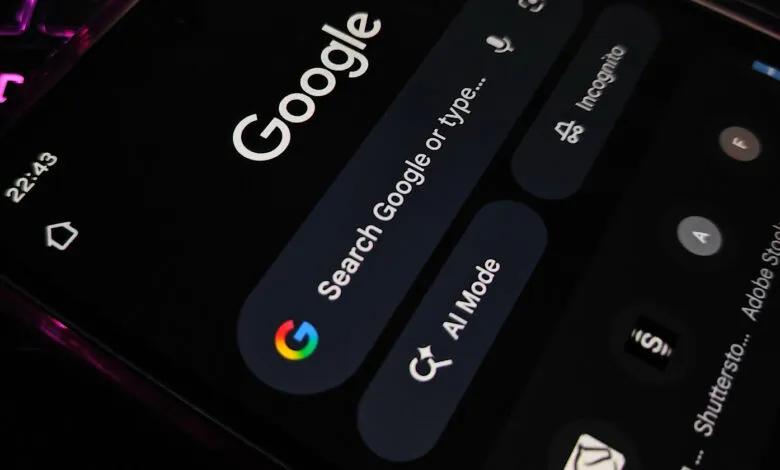 Close-up of a smartphone screen displaying the Google search app with 'AI Mode' highlighted.