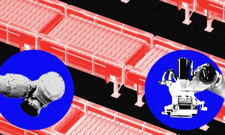 Close-up of robotic arms and a conveyor belt system in a manufacturing setting.