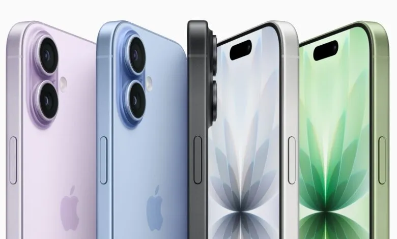 Close-up of four iPhones in lavender, blue, black, and green colors.