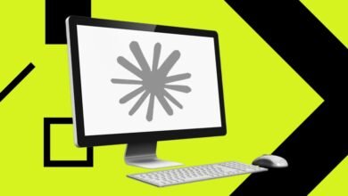 Computer with keyboard and mouse on a bright yellow and black background.