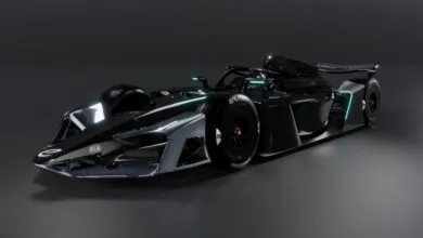 Sleek, futuristic black Formula E race car with glowing blue accents.