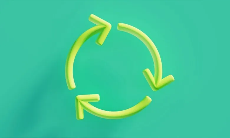 A 3D rendering of a green recycling symbol with three arrows in a circular motion.