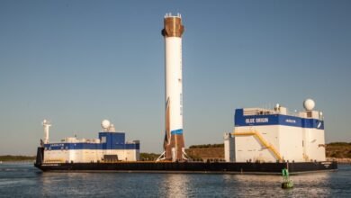 Blue Origin's New Glenn rocket stands tall on the Jacklyn landing vessel at Port Canaveral.