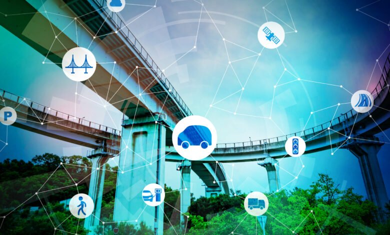 Overhead highway infrastructure with digital network overlay and transportation icons.