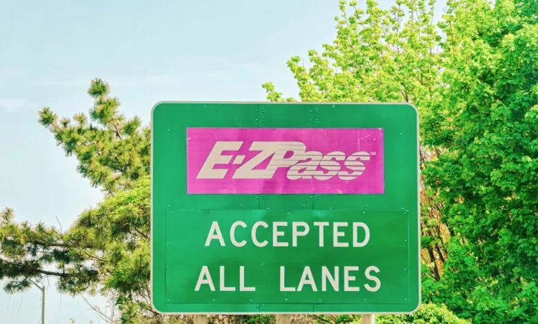 Green road sign indicating E-ZPass is accepted in all lanes.