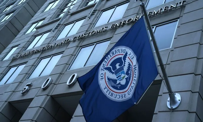 U.S. Immigration and Customs Enforcement building with flag.