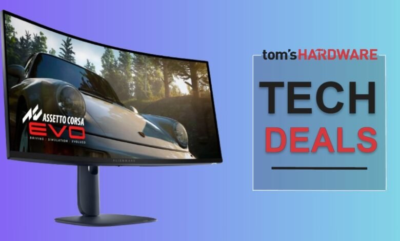 Curved monitor displaying Assetto Corsa Evo racing game with a sports car.