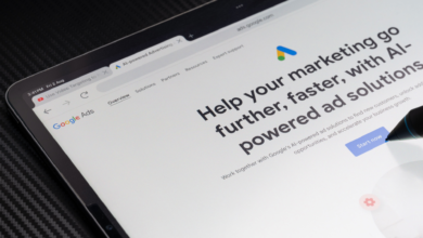 Close-up of a tablet screen displaying the Google Ads homepage with AI-powered solutions.