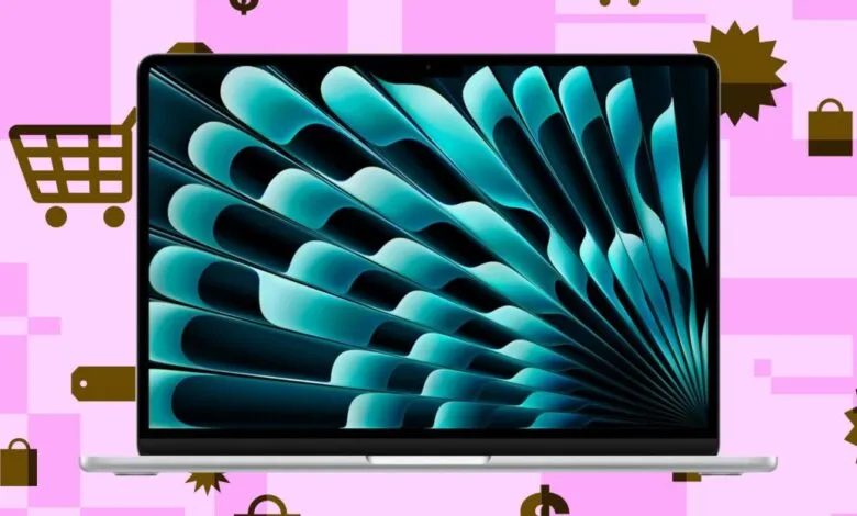 A silver laptop displays a vibrant teal abstract wallpaper, surrounded by shopping icons on a pink background.