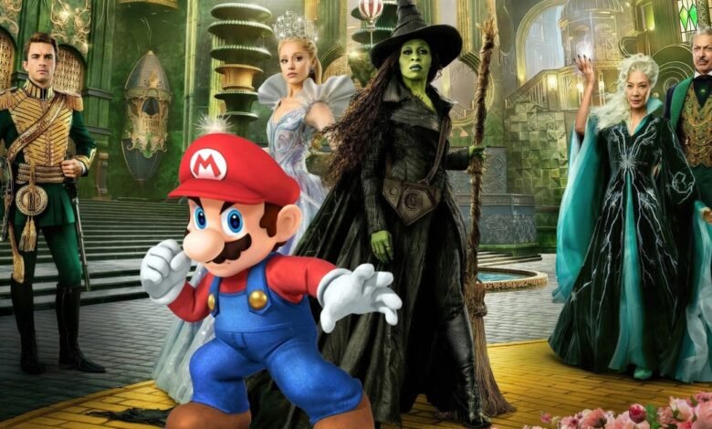 Mario character stands in front of the cast of Wicked, including the Wizard and witches.