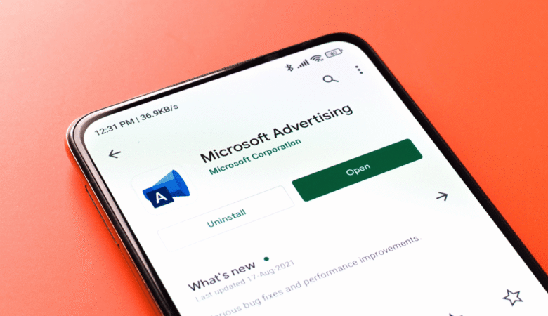 Close-up of a smartphone screen displaying the Microsoft Advertising app page.