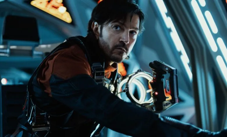 Diego Luna as Cassian Andor in a sci-fi setting, looking intently.